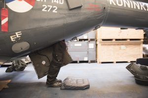 Engineer at work on military aircraft teardown