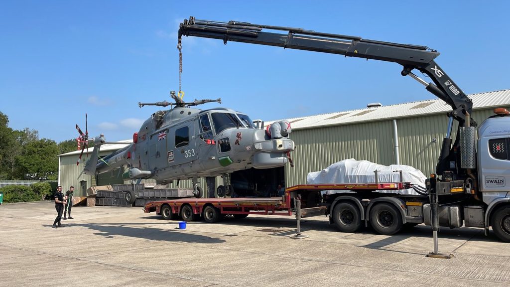 Lynx helicopter being winched onto transport trailer